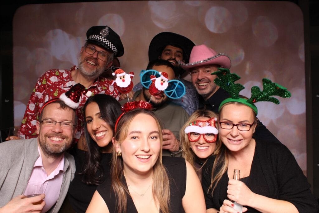 large group of guests with silly props with wards photo booths