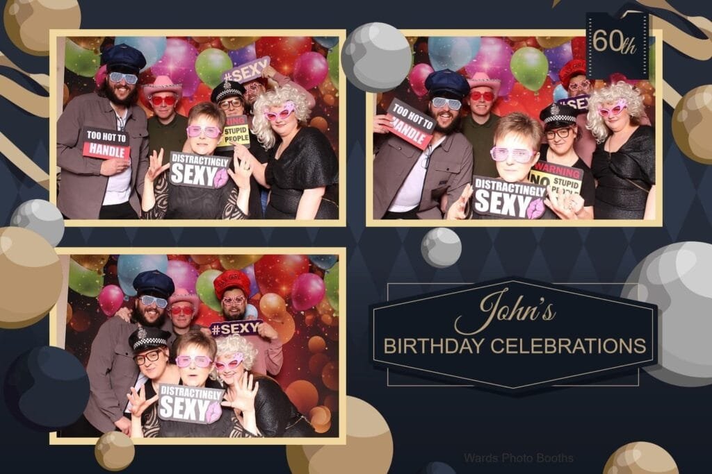 Birthday celebration in a photo booth with silly props