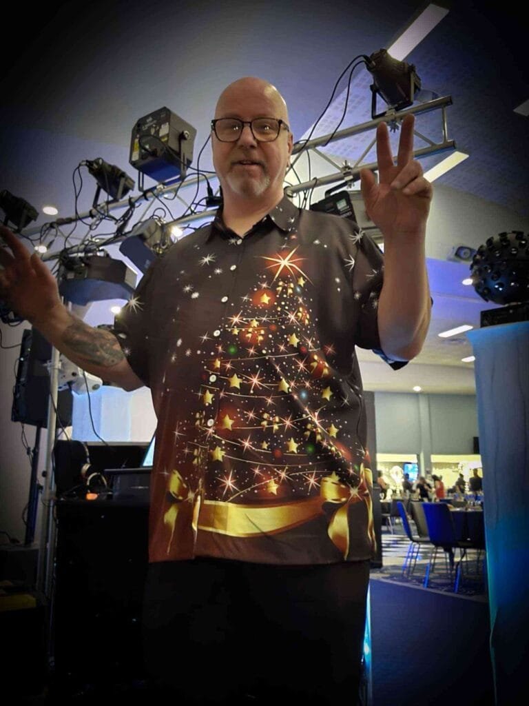 Mark Ward standing in front of a disco setup